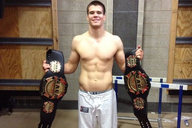MickeyGall-with-his-championship-Belt